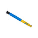 Bilstein 4600 series blue and yellow shock absorber on white background in close up view