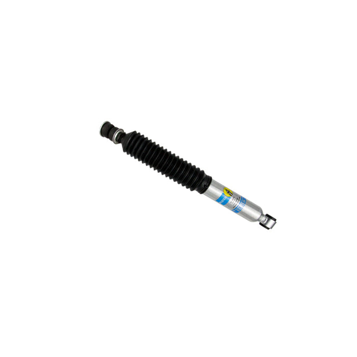 Close up of small metal shock absorber with pen, bilstein 5100 series ford bronco custom