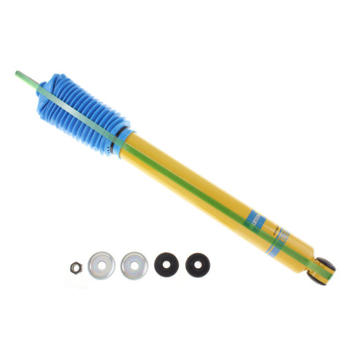 Yellow shock absorber with blue rubber spring and washer on bilstein 5100 series 1997 ford f-150 base 4wd rear 46mm mon