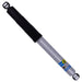 Black and white pen with blue tip on bilstein shock absorber