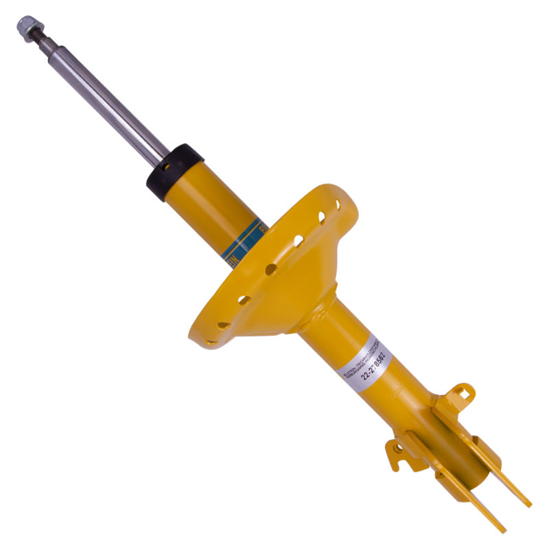 Bilstein b6 shock absorber with yellow hydraulic jack on white background