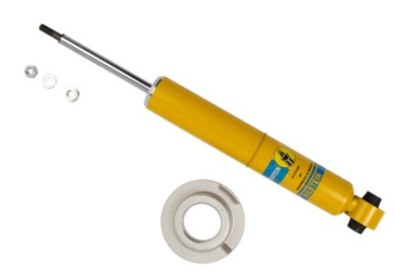 Yellow hydraulic cylinder with white ring, showing bilstein b6 shock absorber consistency