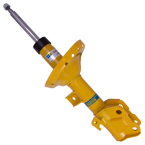 Bilstein b6 shock absorber for subaru outback, yellow hydraulic jack on white background