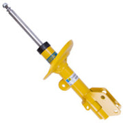 Bilstein b6 subaru crosstrek front left strut assembly with yellow hydraulic jack