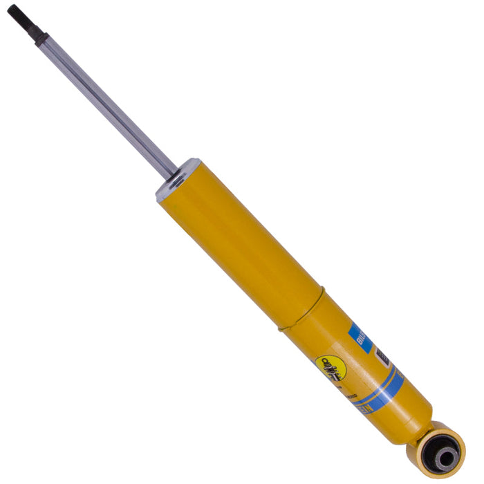 Yellow hydraulic cylinder with black handle on bilstein b6 shock absorber