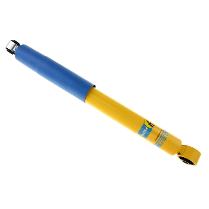 Blue and yellow pen with black tip on bilstein b6 1999 chevrolet silverado 1500 base rwd rear 46mm monotube shock abs