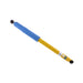 Blue and yellow pen with black tip, displayed in bilstein b6 1999 land rover discovery series ii front 36mm monotube steering damper