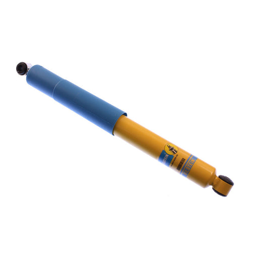 Blue and yellow pen with black tip displayed on bilstein b6 2002 ford excursion eddie bauer 4wd front 46mm monotube shock abs