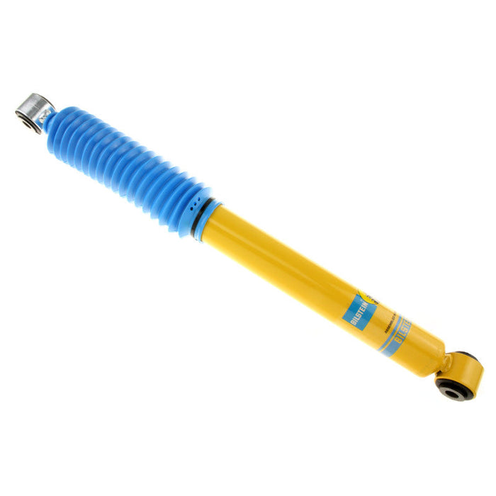 Yellow shock absorber for 2004 nissan titan le 4wd rear bilstein b6 monotube shock absorber on white background