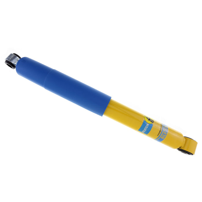 Blue and yellow pen with black tip on bilstein b6 2005 nissan frontier le rear 46mm monotube shock absorber