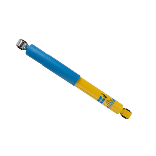 Blue and yellow pen with metal tip next to bilstein b6 4600 rear monotube shock absorber