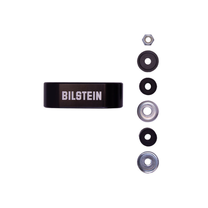 Black belt with white buckle displayed in bilstein b8 5160 series remote reservoir shock absorber