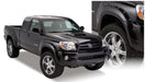 Black toyota tacoma pocket style fender flares on white background