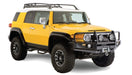 Yellow toyota fj cruiser truck with black roof rack - bushwacker extend-a-fender style flares 4pc