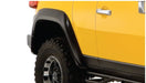 Yellow truck with black tire cover - bushwacker 07-14 toyota fj cruiser extend-a-fender style flares