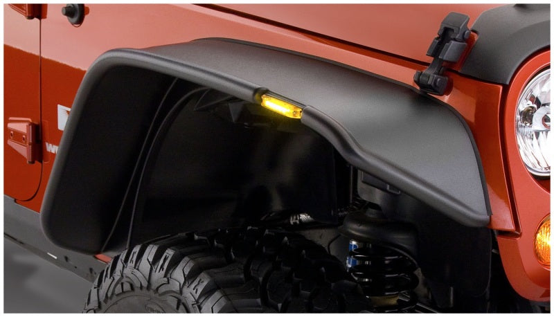 Close up of front bumper and bumper cover on jeep with bushwacker 07-18 jeep wrangler flat style flares - black