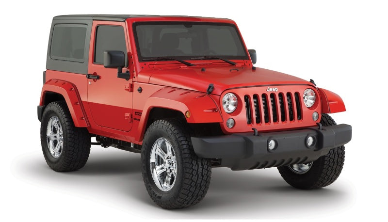 Red jeep wrangler with black pocket style flares and white wheels