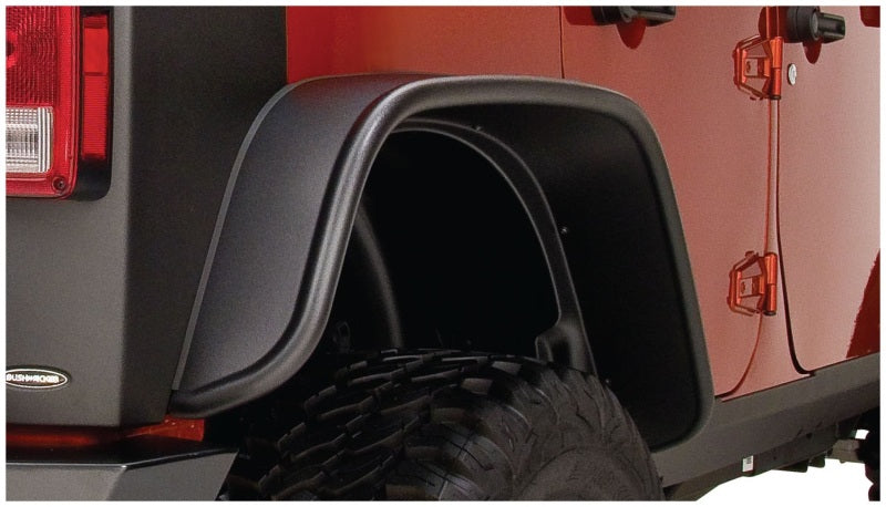 Black tire cover with tire guard on bushwacker jeep wrangler unlimited flat style fender flares