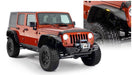 Red jeep with black bumper - bushwacker flat style fender flares