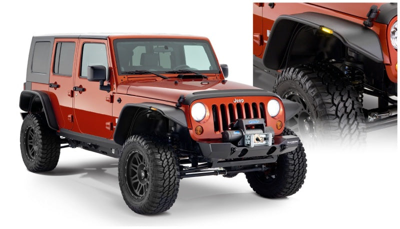 Red jeep with black bumper - bushwacker flat style fender flares