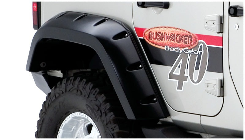 Black jeep wrangler unlimited with max pocket style fender flares