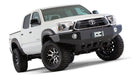 White toyota tacoma with pocket style fender flares in black