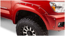 Red truck with black tire cover - bushwacker pocket style fender flares for toyota tacoma