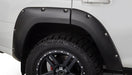 White truck with black wheels and tire - bushwacker toyota 4runner pocket style flares black