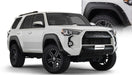 White toyota 4runner with black bumper - bushwacker pocket style flares