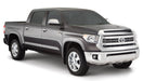 Gray toyota tundra fleetside fender flares on white background