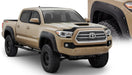 Black pocket style fender flares on toyota tacoma truck