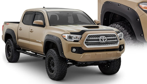 Black pocket style fender flares on toyota tacoma truck