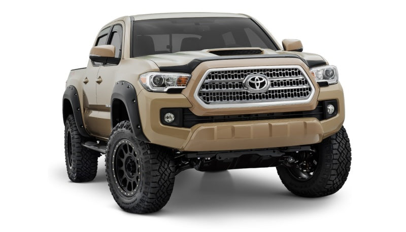 Black toyota tacoma pocket style fender flares - bushwacker 4pc product image