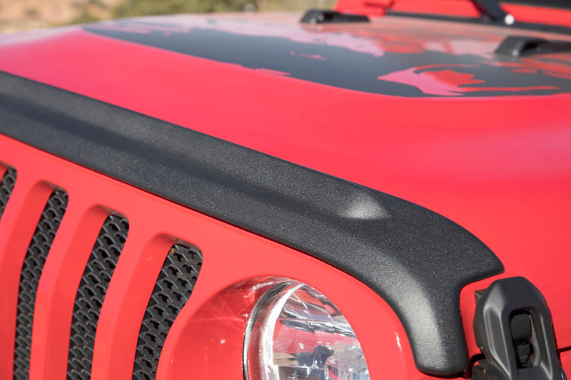 Red jeep wrangler rubicon with black hood stone guard