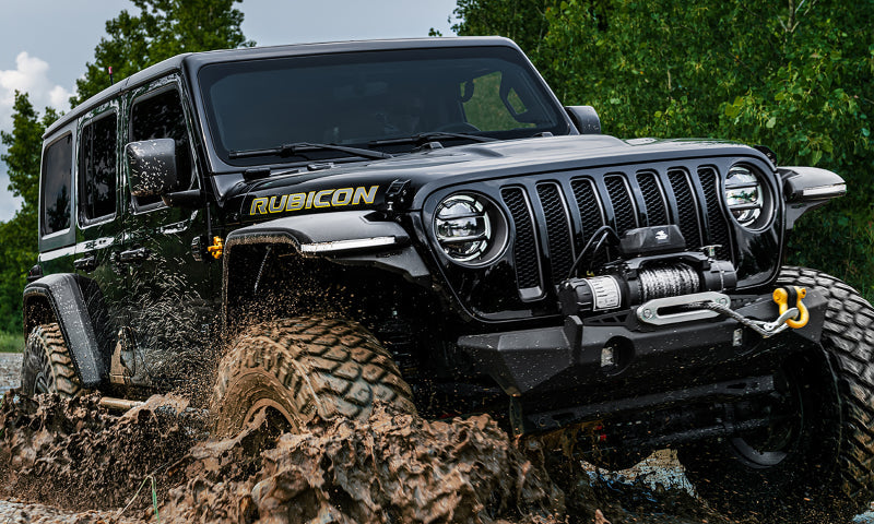 Bushwacker 18-21 jeep wrangler jl hyperform fender flares driving through mud in black - 4pc