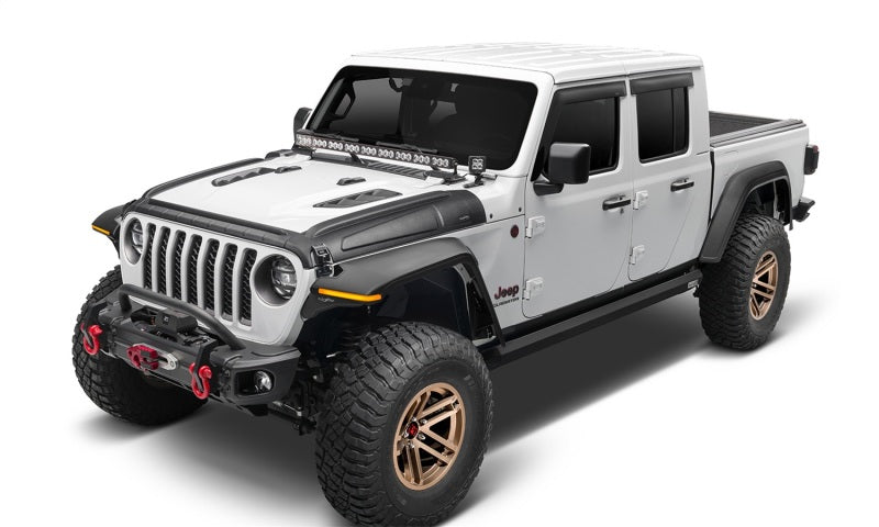 White jeep wrangler with black top and gold accents - bushwacker trail armor hood armor