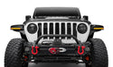 Close-up of bushwacker trail armor hood armor on a red-lighted jeep wrangler