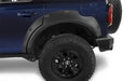 Blue truck front end with pocket style fender flares from bushwacker for ford bronco 4-door