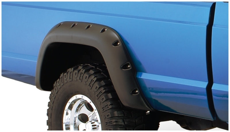 Black fender flare cover on truck - bushwacker 84-01 jeep cherokee cutout style flares