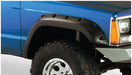 Blue truck with black and white bumpers - bushwacker jeep cherokee fender flares