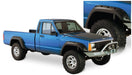 Blue truck with black bumper against white background - bushwacker jeep cherokee cutout style flares 4pc