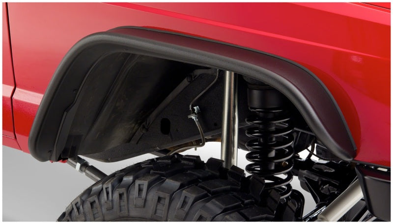 Bushwacker flat style fender flares on red jeep front bumper