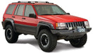 Red jeep grand cherokee fender flares - black bumper on white background