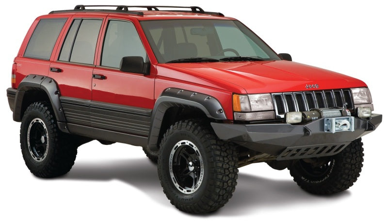 Red jeep grand cherokee fender flares - black bumper on white background