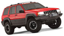 Red jeep grand cherokee with black fender flares