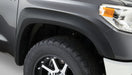 Gray toyota tacoma truck with black tire, bushwacker extend-a-fender style flares for 95-04 toyota tacoma 4wd - black