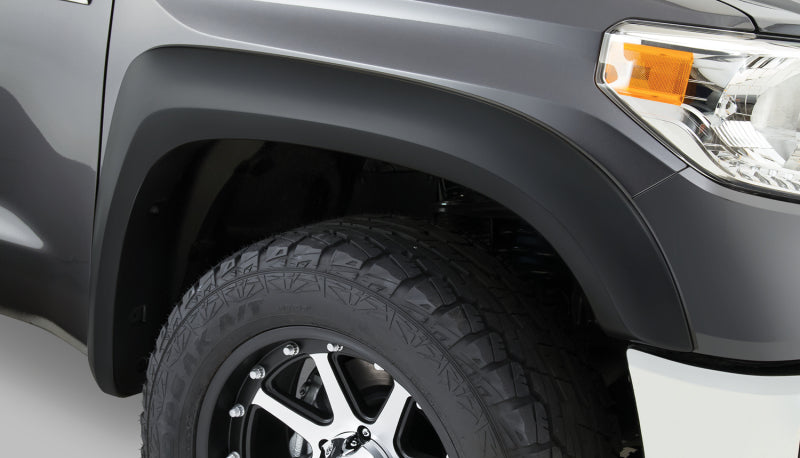 Gray toyota tacoma truck with black tire, bushwacker extend-a-fender style flares for 95-04 toyota tacoma 4wd - black