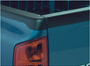 Close up of the tail light on blue truck with bushwacker 95-04 toyota tacoma fleetside bed rail caps