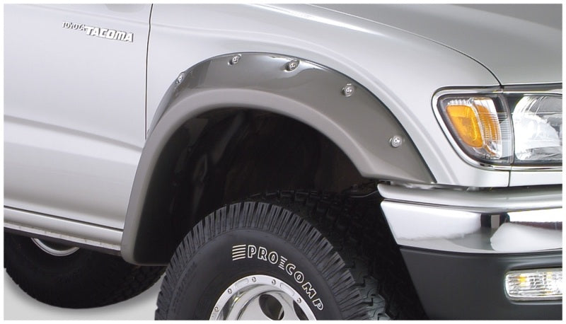 Silver truck with black tire cover and fender flares for toyota tacoma fleetside