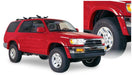 Red truck with bushwacker 96-02 toyota 4runner extend-a-fender style flares in black